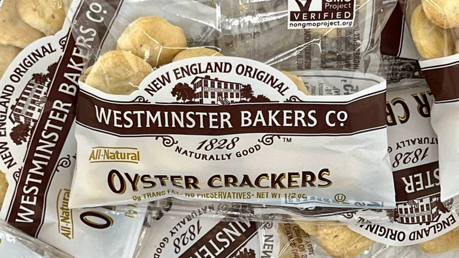 Individually wrapped Westminster Bakers Co. oyster cracker packets, 0.5 oz each, with the Non-GMO Project Verified seal visible
