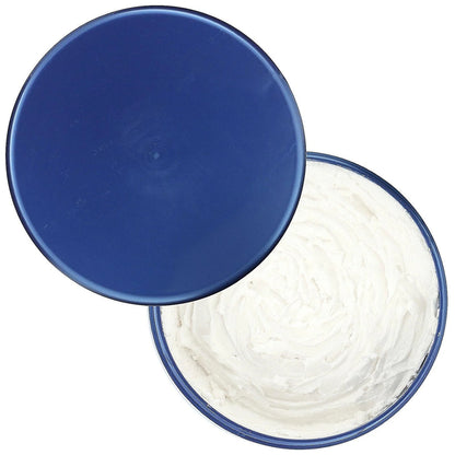 Open jar of Noxzema Classic Clean Moisturizing Cleansing Cream with visible creamy texture, featuring a blue lid placed beside it.