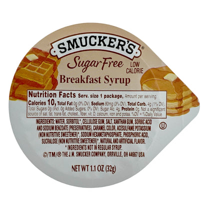 Smucker's sugar-free breakfast syrup, low calorie, 1.1 oz, with nutrition facts and ingredients listed on the label.